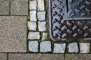 Detailed close up on old historical cobblestone roads and walkways photo