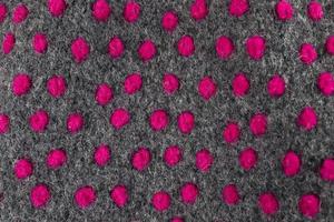 Close up view on samples of cloth and fabrics in different colors found at a fabrics market photo