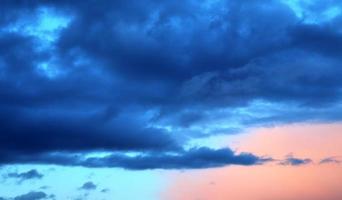 Beautiful panorama of orange and yellow clouds at sunrise photo