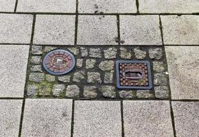 Detailed close up on old historical cobblestone roads and walkways photo