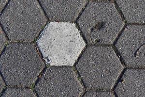 Detailed close up on old historical cobblestone roads and walkways photo