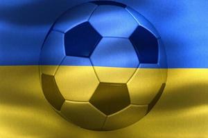 3D-Illustration of a Ukraine flag with a soccer ball moving in the wind photo