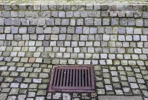 Detailed close up on old historical cobblestone roads and walkways photo