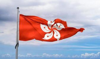 bandera de hong kong - bandera de tela ondeante realista. foto