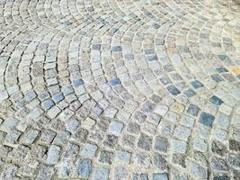 Old historical cobblestone roads and walkways all over europe. photo