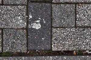 Detailed close up on old historical cobblestone roads and walkways photo