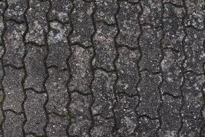 Detailed close up on old historical cobblestone roads and walkways photo