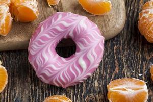 doughnuts with berry filling and chocolate photo