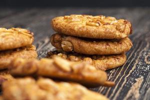 round cookies with roasted peanuts photo