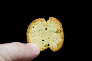 thin fried rye crackers with spices photo