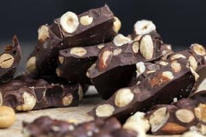 homemade chocolate with a large number of nuts photo
