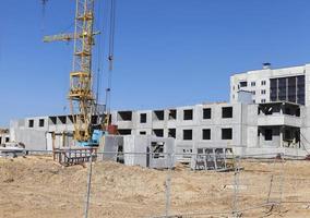 construction of apartment houses in the developing area photo