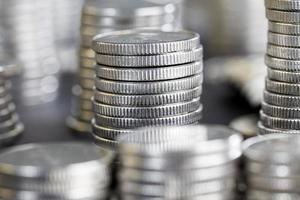 a large number of silver colored metal coins photo