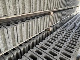 cement brick lined up stack background photo