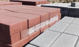 Packed on new wooden pallets, concrete tiles photo
