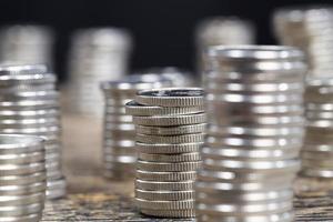 a large number of silver colored metal coins photo