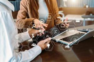 Business team open his hand, working touch screen computer, smartphone and tablet photo