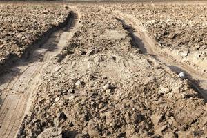 close up of a rural sand road photo