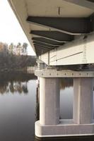 concrete bridge across the river photo