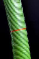 orange and many green plastic cups photo