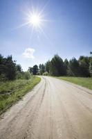 rural not asphalt wide sandy road photo