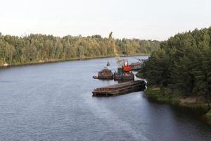 logging on a river photo