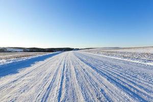 traces of the car on snow photo
