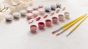 A set of colorful gouache for painting by numbers, pastel colors, drawing on canvas photo