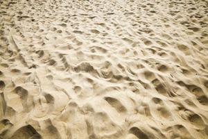 wavy uneven structure of sand photo