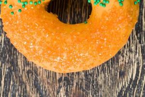 delicious and fresh orange doughnut photo