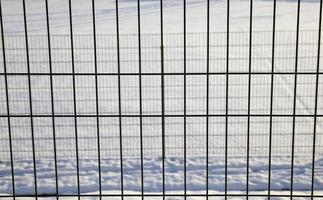 thin metal fence photo