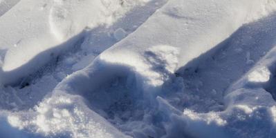 Snow drifts in winter photo