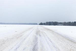 Snow drifts in winter photo