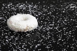 white doughnut in coconut photo