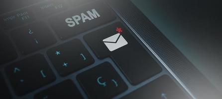 banner de teclado con concepto de botón de spam de correo. tecnología empresarial de la comunicación. proteger el correo no deseado de la seguridad cibernética de Internet. foto