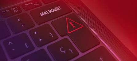 Banner of malware warning keyboard. Cyber security data protection business technology. photo