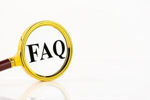 The word FAQ. A collection of frequently asked questions on any topic and answers to them. Instructions and rules on websites. Copy space photo