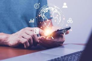 Businessman using mobile smart phone. Business global internet connection application technology and digital marketing, Financial and banking, Digital link tech, big data. photo