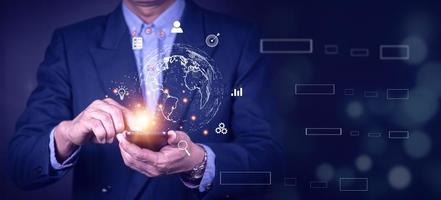 Businessman using mobile smart phone. Business global internet connection application technology and digital marketing, Financial and banking, Digital link tech, big data. photo