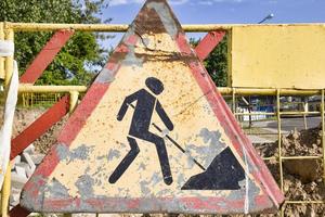 Old yellow temporary road sign photo