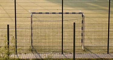 playing field with a gate photo