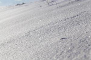 Snow drifts in winter   snow photographed in the winter season, which appeared after a snowfall. close up, photo