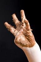 smeared in chocolate hands photo