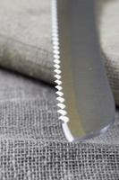 wavy blade of a steel knife photo