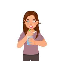 beautiful young woman feeling sick taking medicine capsule with a glass of water vector