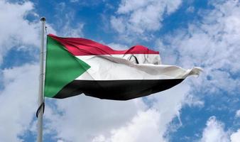 Sudan flag - realistic waving fabric flag. photo