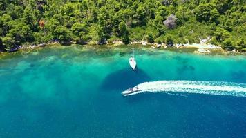 Speedboat turning in a lagoon Limanaki Mplo Skopelos Greece 4K video