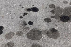 spots from car oil, close up photo