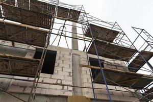 scaffolding during the construction of a multi storey building photo