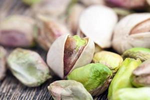 salted and roasted pistachio nuts photo